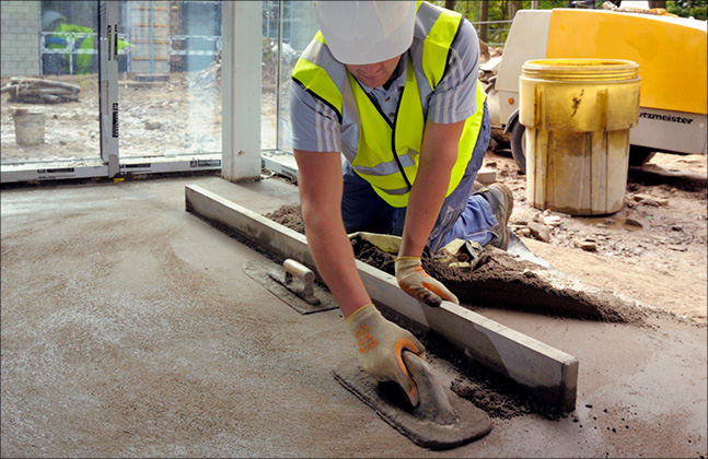 Level the Concrete with a Screed Board